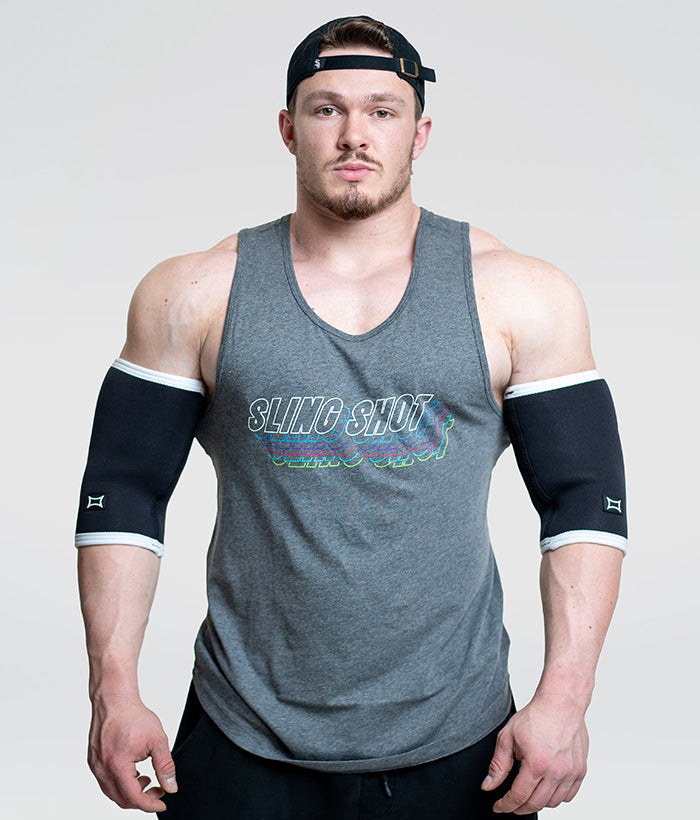male wearing black and white elbow sleeves