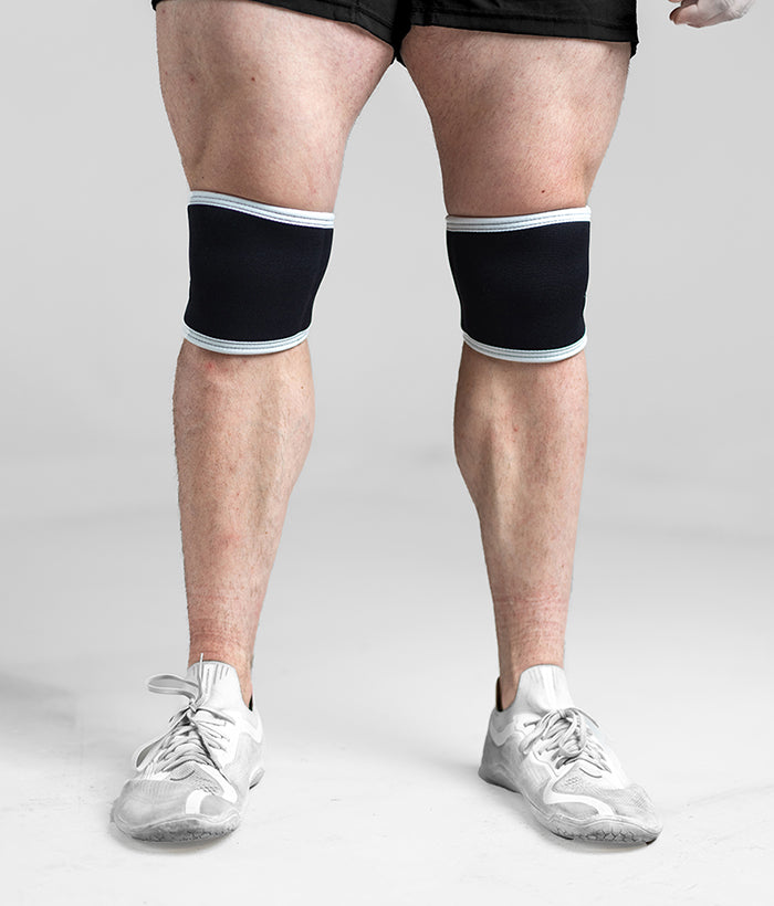 raw black and white knee sleeves