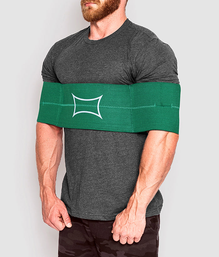 Male wearing green sling shot